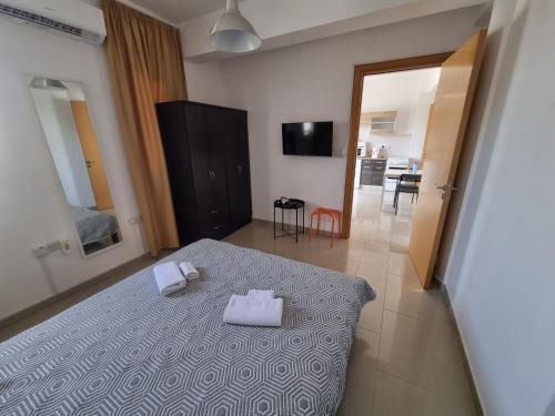 Letto o letti in una camera di Valentinos Apartments