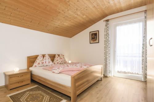 Llit o llits en una habitació de Traterhof-Spinges