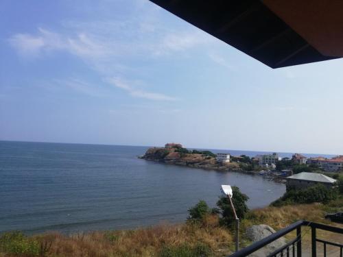a view of the ocean from a balcony at Sea view apartment in Tsarevo
