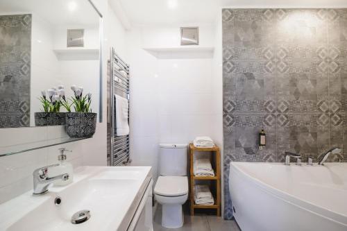 Ένα μπάνιο στο be HAPPY Apartments