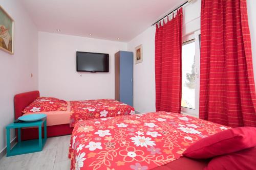 Postel nebo postele na pokoji v ubytování Resort due gatte Pinky Trogir