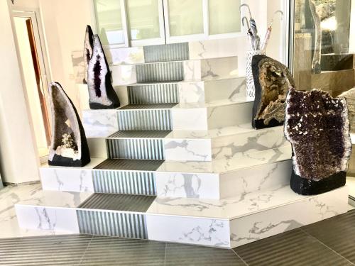 a display of shoes on a stairs in a store at Sunshine Ocean Sea View in Chaweng