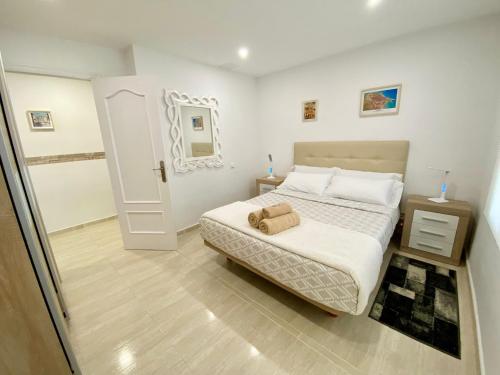 En eller flere senger på et rom på Ático con terraza centro de Tarragona, Mi Refugio