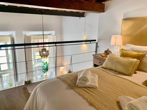 Posteľ alebo postele v izbe v ubytovaní Homely Málaga Loft Especerías