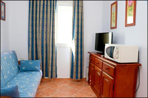 TV a/nebo společenská místnost v ubytování Apartamento Calle Bilbao
