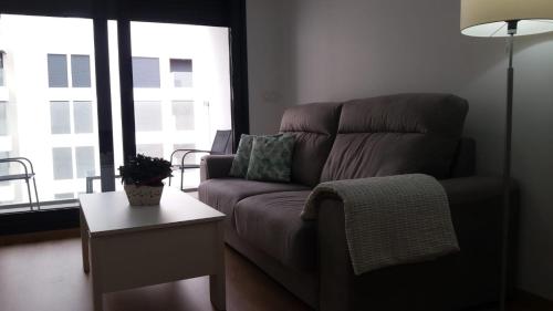 Et opholdsområde på Apartamento Villa Pepita