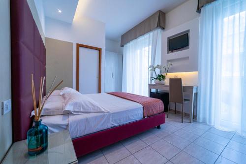 Katil atau katil-katil dalam bilik di Hotel Stella D'Oro