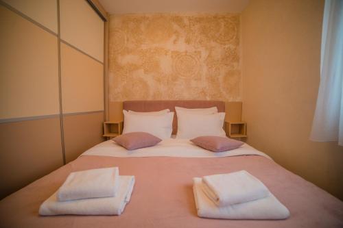Voodi või voodid majutusasutuse Aria Club Wellness&Spa Zlatibor toas