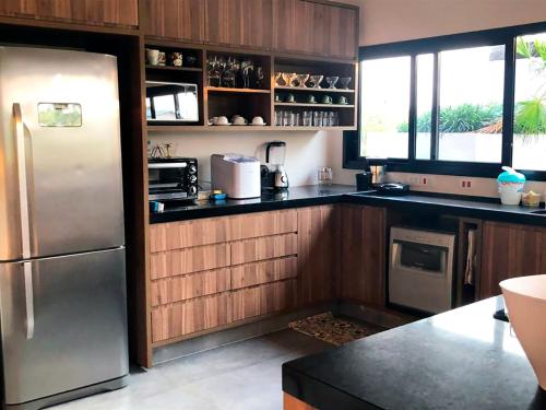 Kuchyň nebo kuchyňský kout v ubytování Casa com piscina aquecida e churrasqueira em Itu