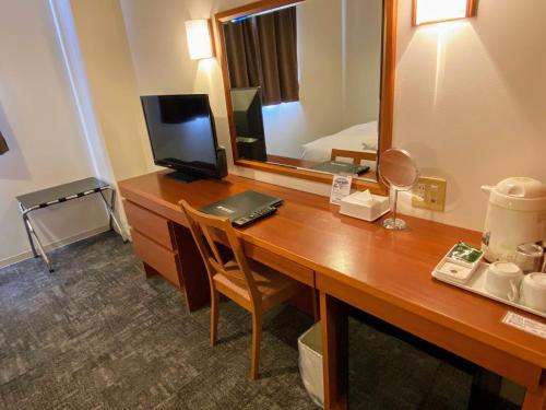Televisyen dan/atau pusat hiburan di Blue Port Hotel Kitakyushu Airport