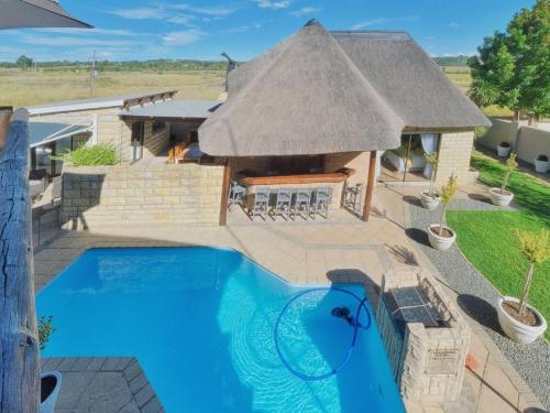 an overhead view of a house with a swimming pool at The Perfect Lodge in Bethlehem