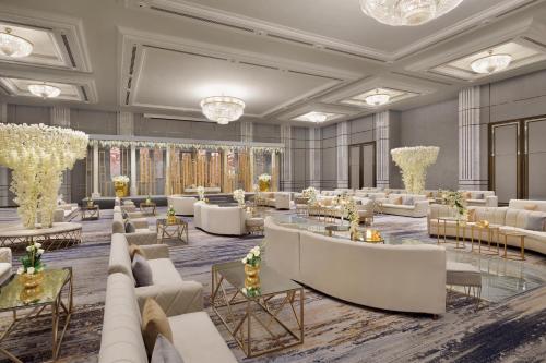 a rendering of a hotel lobby with couches and tables at Al Ahsa InterContinental by IHG in Al Ahsa