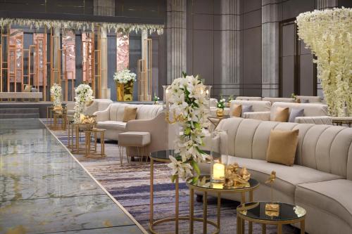 a rendering of a lobby with couches and tables at Al Ahsa InterContinental by IHG in Al Ahsa