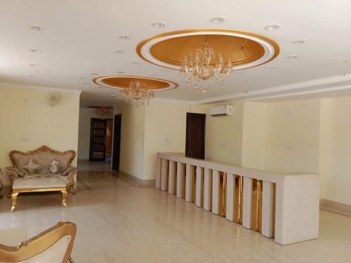 Χώρος καθιστικού στο Hotel SKS Grand Palace-Vrindāvan