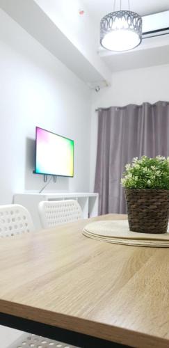 TV a/nebo společenská místnost v ubytování S Residences-MOA