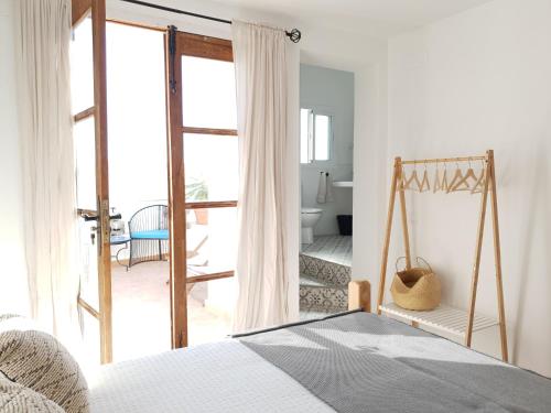 Postel nebo postele na pokoji v ubytování Casa Maroma