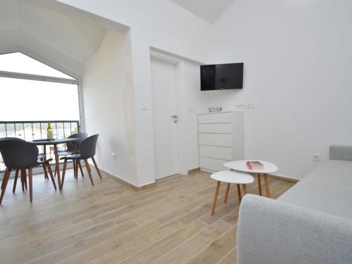 TV a/nebo společenská místnost v ubytování Apartment Anna-2 by Interhome