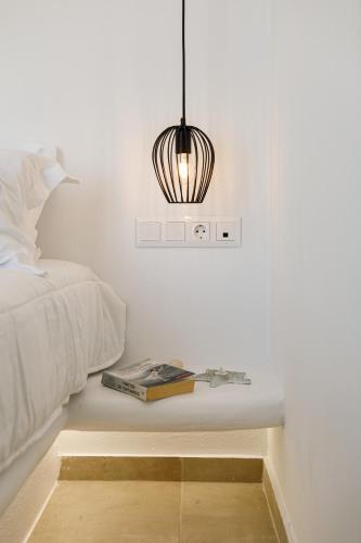 Letto o letti in una camera di Naxos Earth Suites