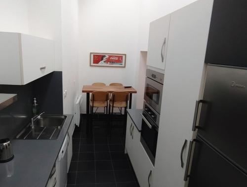 Η κουζίνα ή μικρή κουζίνα στο La Suite 57