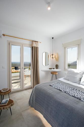 Letto o letti in una camera di Naxos Earth Suites