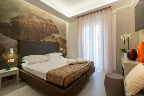 Katil atau katil-katil dalam bilik di Hotel Stella D'Oro