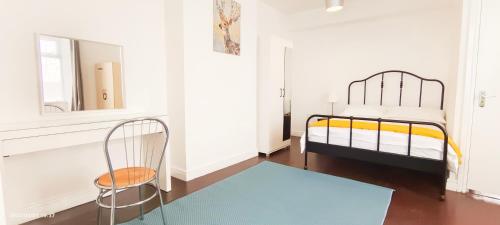 Ένα ή περισσότερα κρεβάτια σε δωμάτιο στο Acacia Flat 189 in Wembley