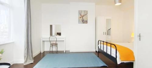 Ένα ή περισσότερα κρεβάτια σε δωμάτιο στο Acacia Flat 189 in Wembley