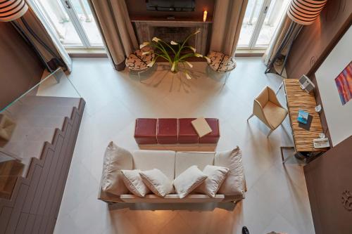 an overhead view of a living room with a couch at Sina Centurion Palace in Venice