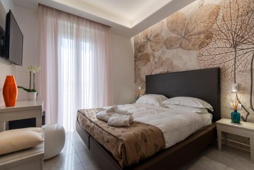 Katil atau katil-katil dalam bilik di Hotel Stella D'Oro