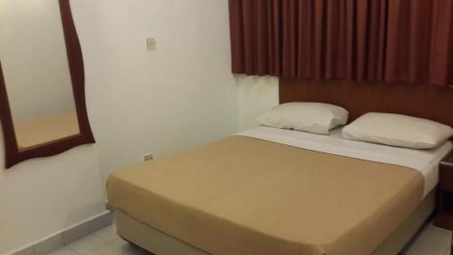 Cama o camas de una habitación en Golden City Apartment - Leisure Holiday Resorts