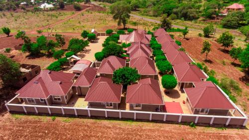 an aerial view of a house with a roof at Randa Family House - Moshi in Himo