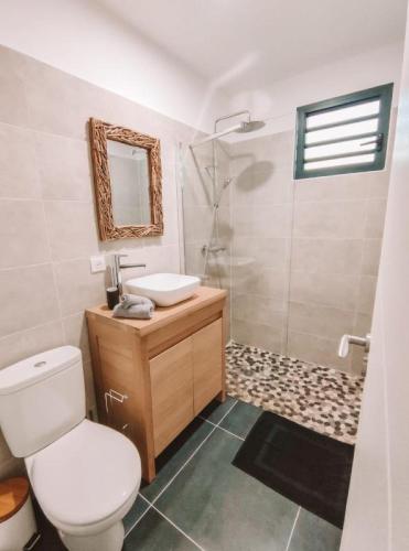Ванная комната в Les Villas Mandju