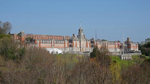 a large red brick building in the distance at The Lookout at Lauriston in Dartmouth
