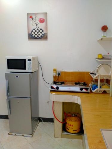 Cuisine ou kitchenette dans l'établissement BabaJay Family Home