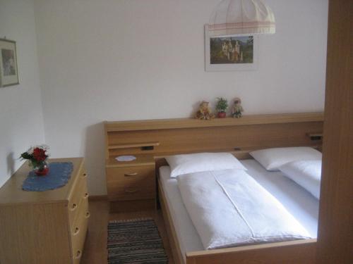 Postel nebo postele na pokoji v ubytování Gandlerhof