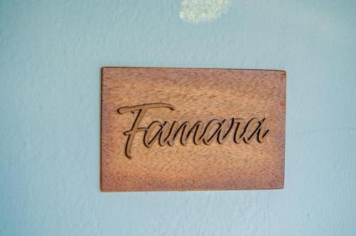 a sign with the word tamland on a wall at Casona de Tao in Tiagua