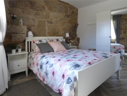 Postel nebo postele na pokoji v ubytování Casa Veiga 1
