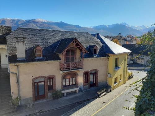 an overhead view of a building with mountains in the background at LAMATACAM, T3, RDC, 2 chamb. centre Argelès Gazost in Argelès-Gazost