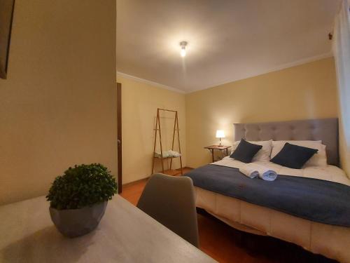 Ένα ή περισσότερα κρεβάτια σε δωμάτιο στο Hostal Casa Encino