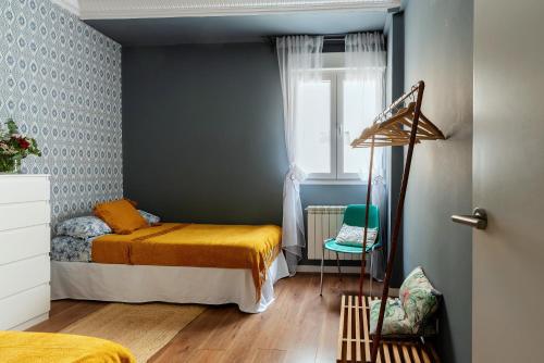 Кровать или кровати в номере Piso de diseño con suit en el centro de Santander