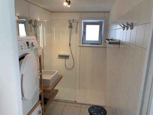 Ein Badezimmer in der Unterkunft Huisjes aan zee