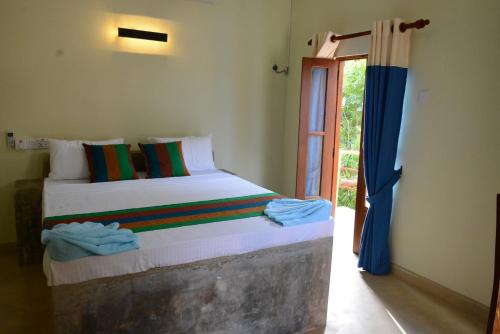 Postel nebo postele na pokoji v ubytování Hotel Thilon