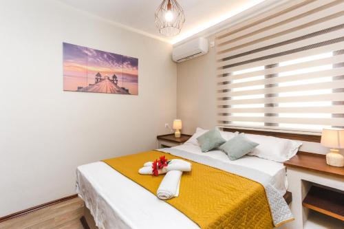Postel nebo postele na pokoji v ubytování TwinStars Maisonette