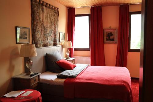 Tempat tidur dalam kamar di Hotel Anker