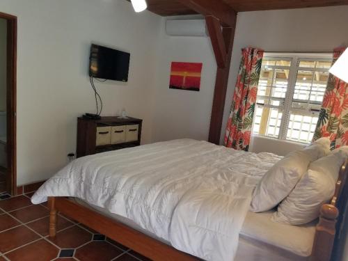 The BNB on Triggerfish Close to the airportにあるベッド