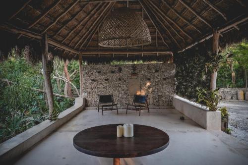 Jardin de l'établissement Wakax Hacienda - Cenote & Boutique Hotel - Small Luxury Hotels of the World