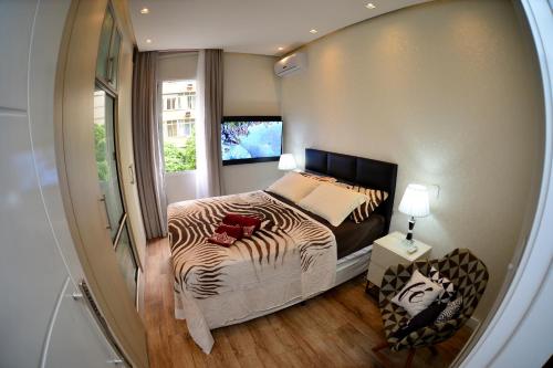 Postel nebo postele na pokoji v ubytování Apartamento Quarto e sala luxo COPACABANA O MUST'