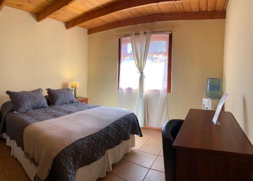 Postel nebo postele na pokoji v ubytování Sami Atacama