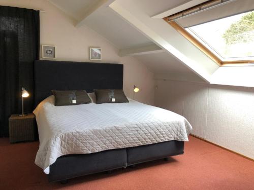 En eller flere senge i et værelse på Apartment Casa Di Mare