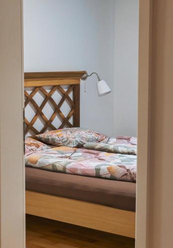 Ένα ή περισσότερα κρεβάτια σε δωμάτιο στο Garden Apartments Bled
